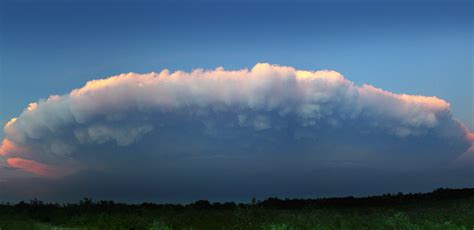 What Weather is Associated with Cumulonimbus Clouds, and Why Do They Sometimes Look Like Giant Cotton Candy?